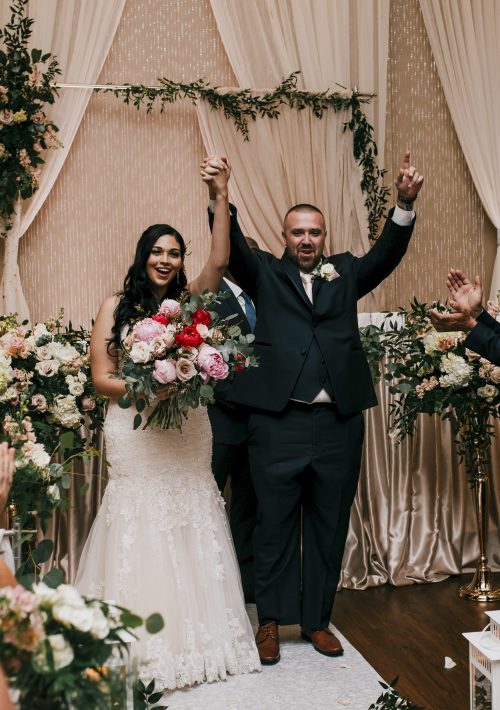 Just Married couple celebrating at Millennium Gardens