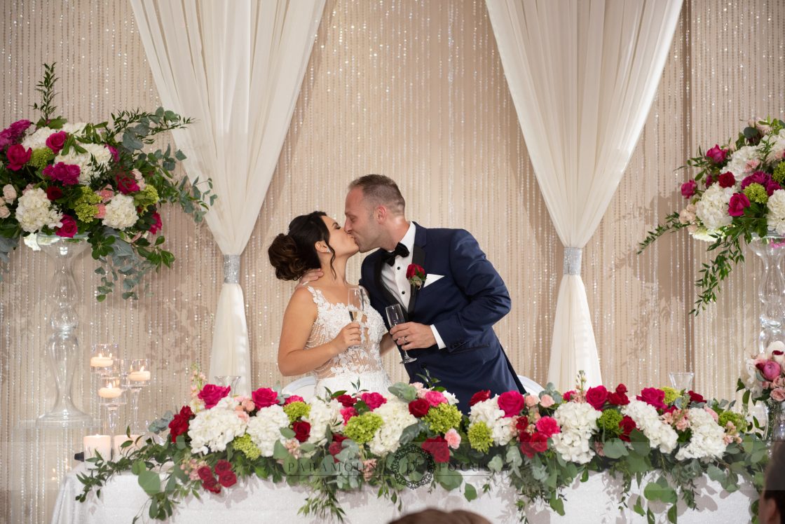 Bride and groom kissing