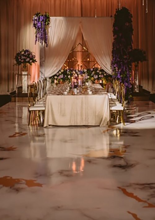 Gold Wedding decor with marble flooring